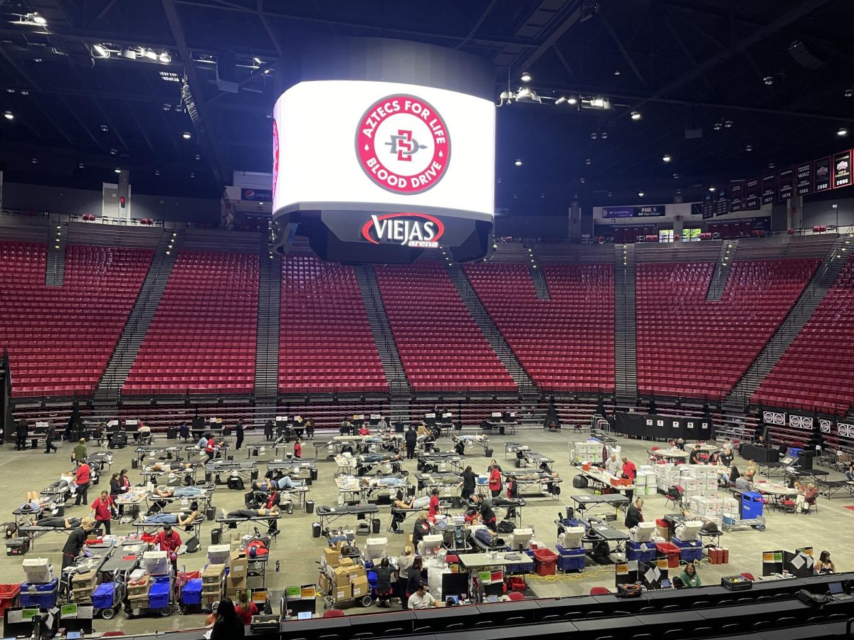 Students giving blood at the center of Viejas Arena on Wednesday, Nov. 13.