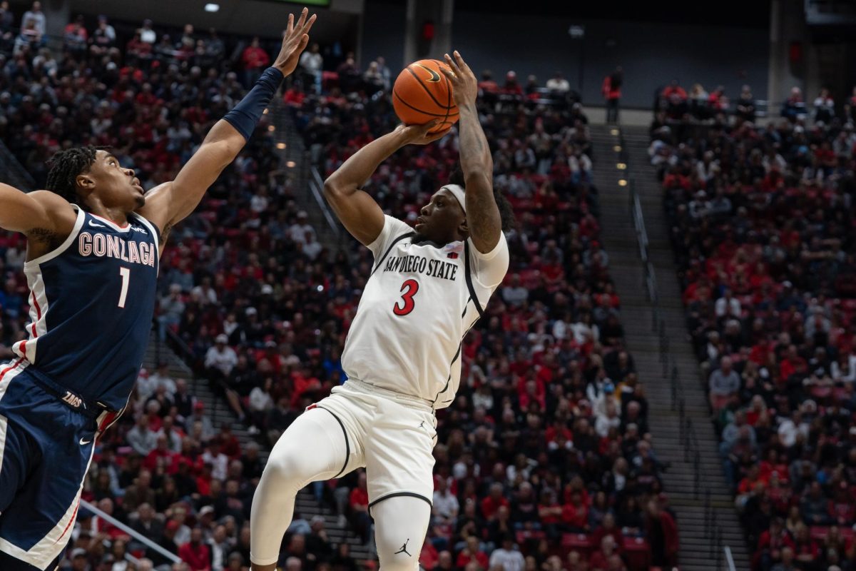 San Diego State senior guard Wayne McKinney III takes a shot against Gonzaga senior guard Michael Ajayi in a 80-67 loss on Monday, Nov. 19 at Viejas Arena. 
