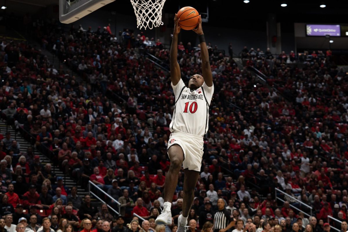 Aztec sophomore guard BJ Davis throws down a break-away dunk during a 80-67 loss to Gonzaga on Monday, Nov. 19 at Viejas Arena. 