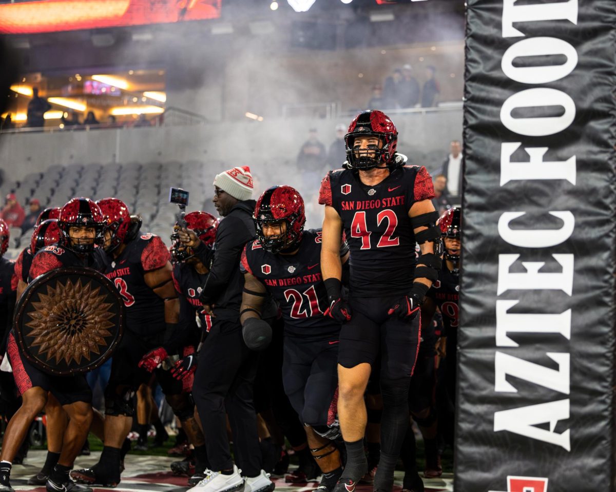 San Diego State football exits the tunnel ahead of their matchup with New Mexico in Snapdragon stadium 