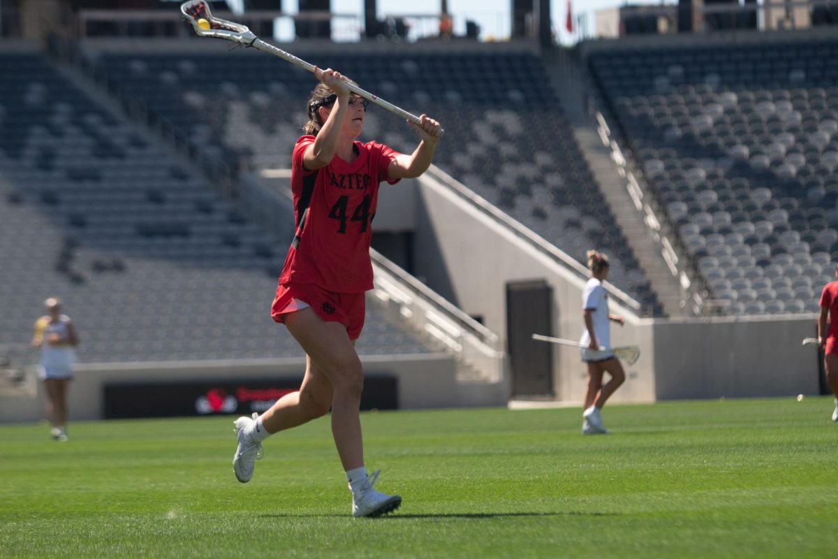 San Diego State defender Reilly Hunter looks to pass during a game last season at Snapdragon Stadium on March 17, 2024