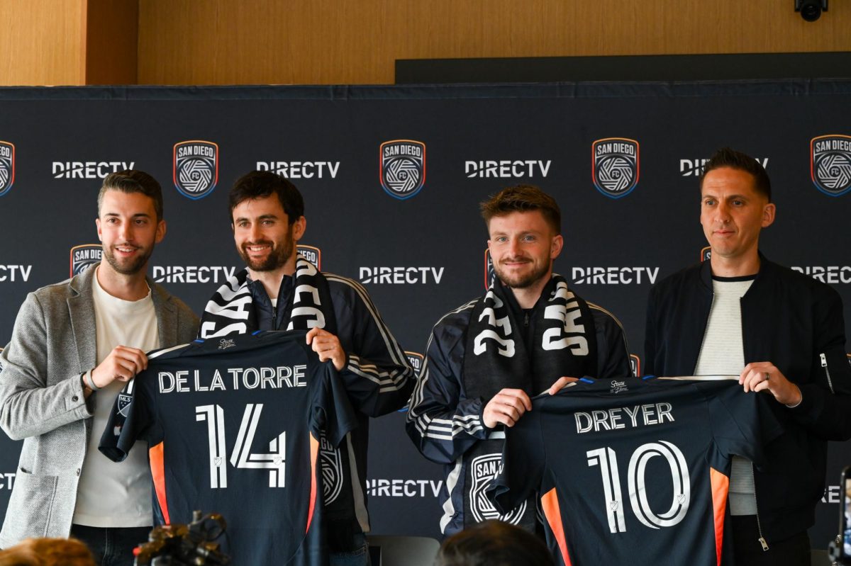 From left to right Tyler Heaps, Luca De La Torre, Anders Dreyer, and Mikey Varas hold up player jerseys after the San Diego FC press Confrence on January 22, 2025.