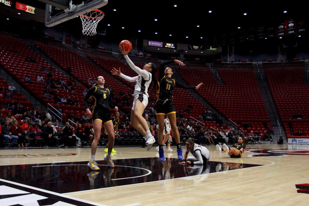 San Diego State junior guard Veronica Sheffy powers her way to the hoop for a layup against the San Jose Spartans at Viejas Arena on January 22, 2025.
