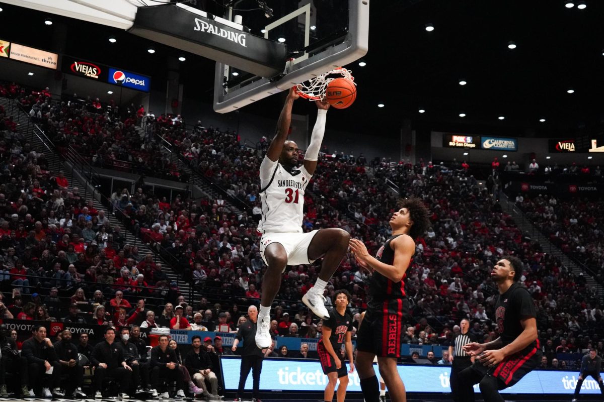 San Diego State senior forward Jared Coleman-Jones throws down a dunk against UNLV on January 18, 2025 at Viejas Arena.