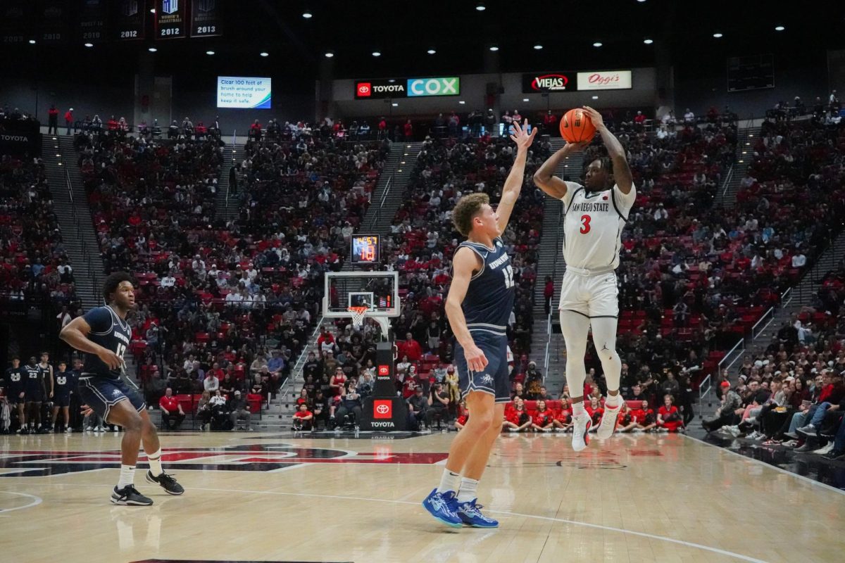 San Diego State senior guard Wayne McKinney III shoots a jumper earlier this season against Utah State at Viejas Arena.