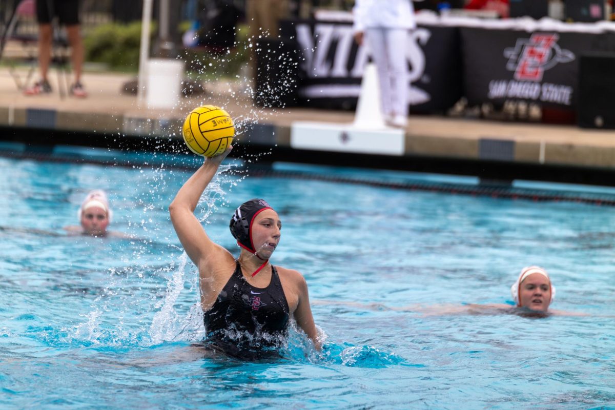 San Diego State attacker Claudia Valdes aims and looks to launch a ball towards the goal against University of Pacific last season at the Aztec Aquaplex. 