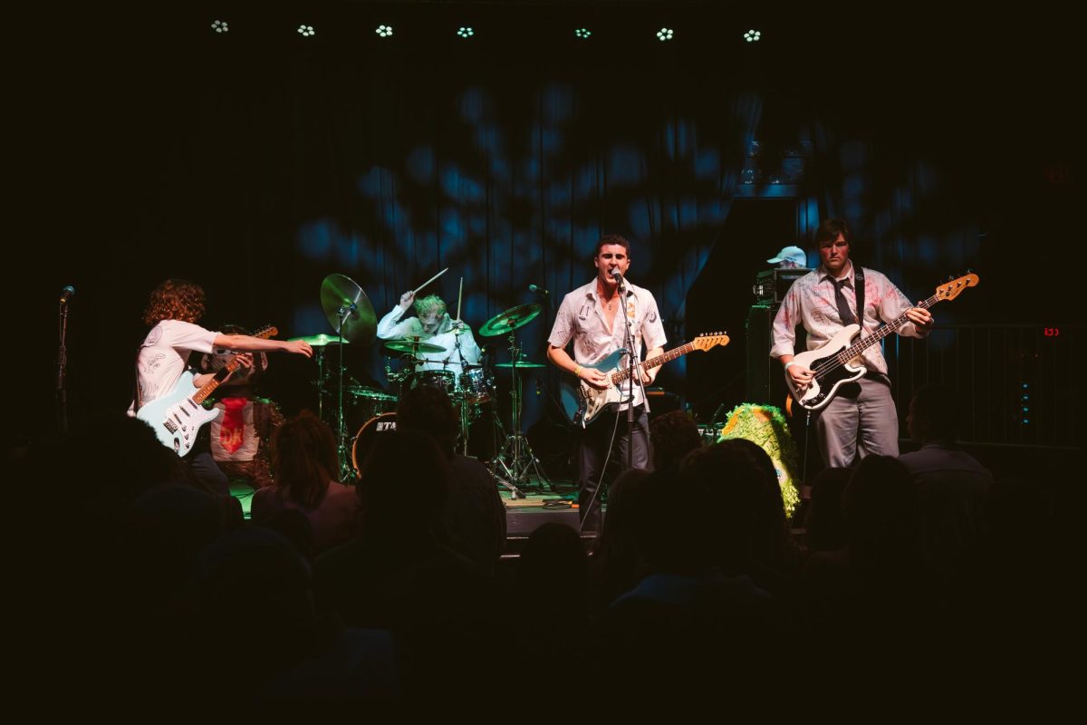 Left to right: Neil Kuhn, Aidan Dominé, Cameron Power and Ben Freeman, members of the band The White Collars, performing. Photo by Sanchez Productions.