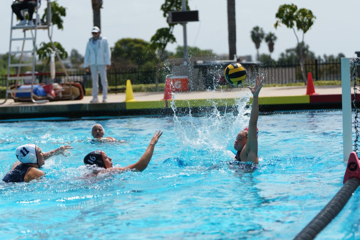 San Diego State center Mimi Stoupas shoots the ball past the goalie before it caught the crossbar against Fresno State at the Aztec Aquaplex on March 29, 2025.
