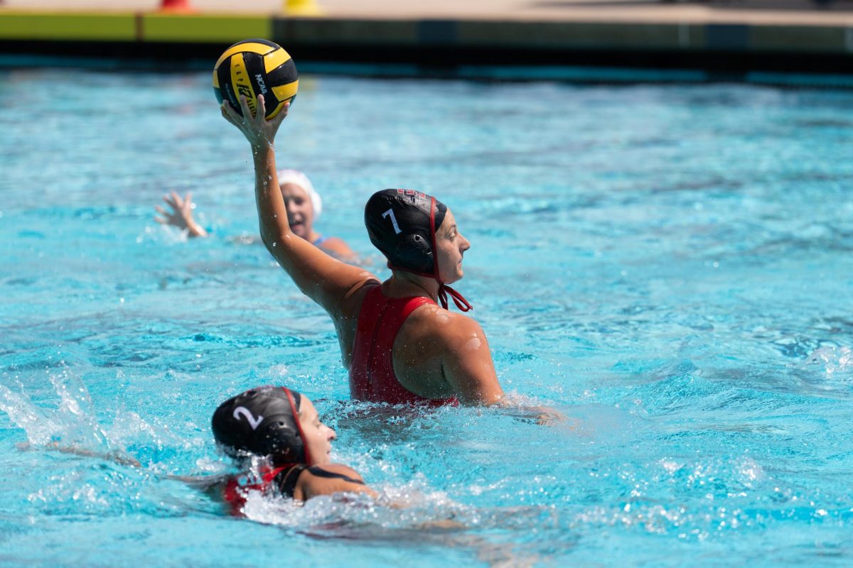 San Diego State senior attacker Rose Kanemy attempts a shot in an 11-17 loss against Loyola Marymount at the Aztec Aquaplex on April 12, 2025. 