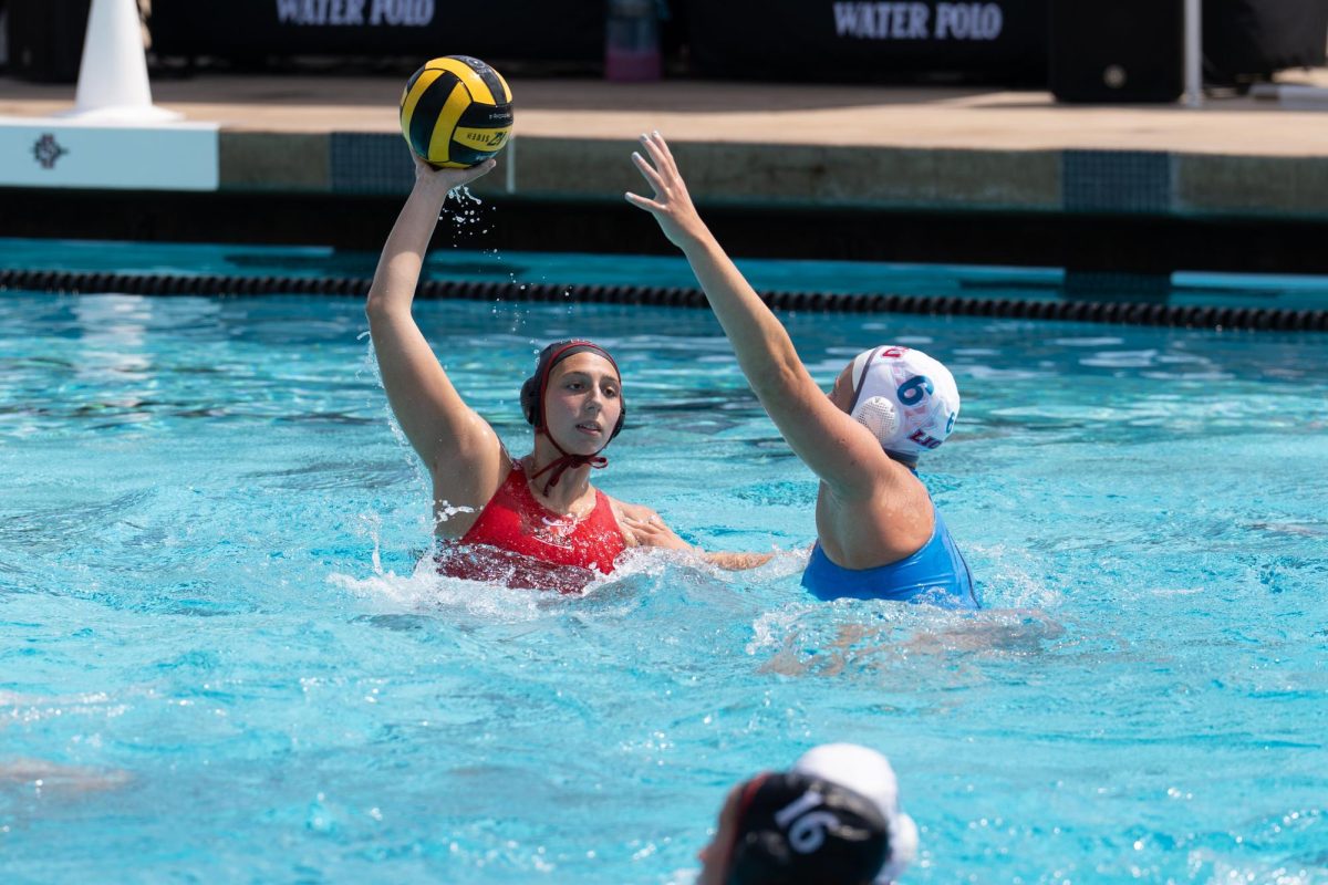 San Diego State junior attacker Claudia Valdes takes a shot to make a goal in an 11-17 loss against Loyola Marymount at the Aztec Aquaplex on April 12, 2025. 