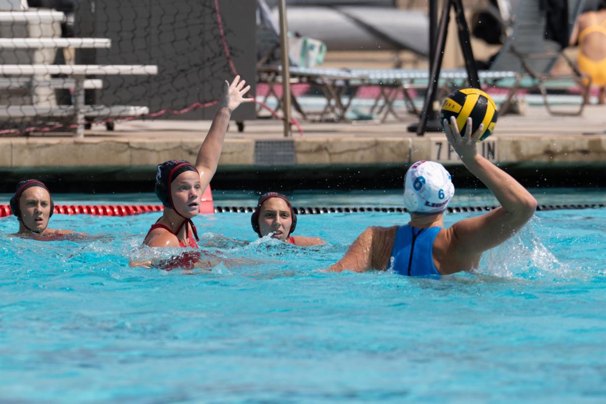 San Diego State sophomore attacker Sammi Byers defends against Loyola Marymount senior utility Anna Tarantino in an 11-17 loss against LMU at the Aztec Aquaplex on April 12, 2025. 