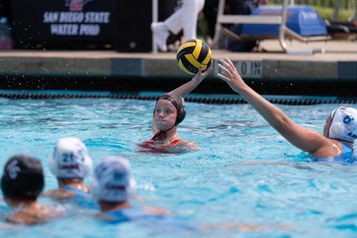 San Diego State sophomore attacker Sammi Byers passes to an open teammate in an 11-17 loss against Loyola Marymount at the Aztec Aquaplex on April 12, 2025. 