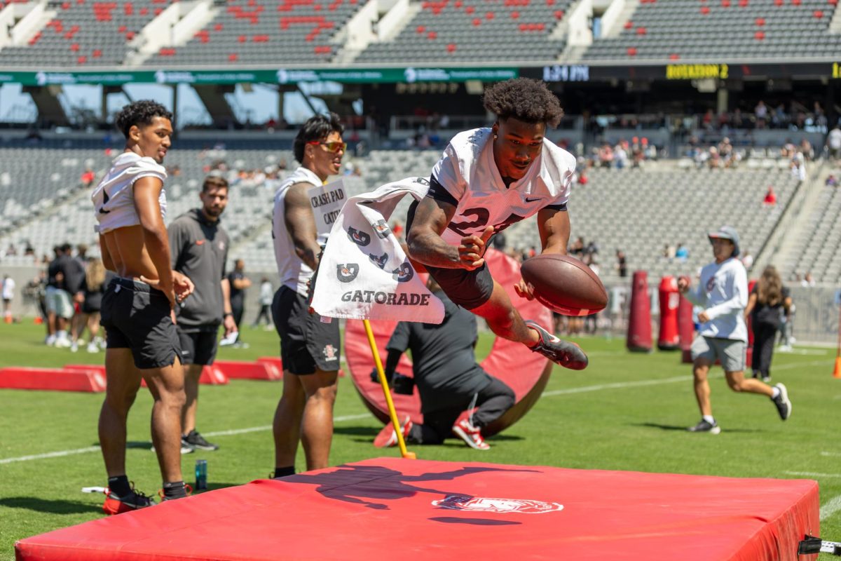 San Diego State cornerback Isaiah Buxton dives for the ball over the landing mat at Snapdragon Stadium on April 19th, 2025.