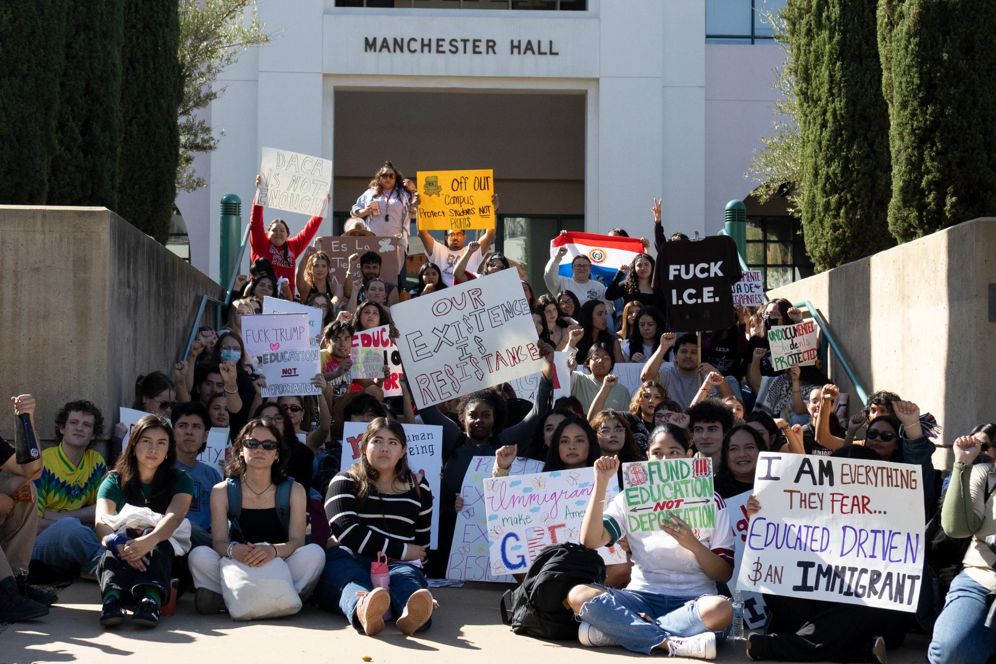 Students sit in front of Manchester Hall outside SDSU's president Adela de la Torre's office on Thursday, Feb. 20, 2025. Student protests have continued nationally as an increasing number of student visas have been revoked by the federal government.