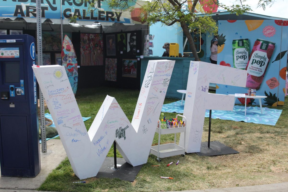 Image of Wonderfront interactive letter art. Festival attendees signed the giant letters with their names & inspiring messages.