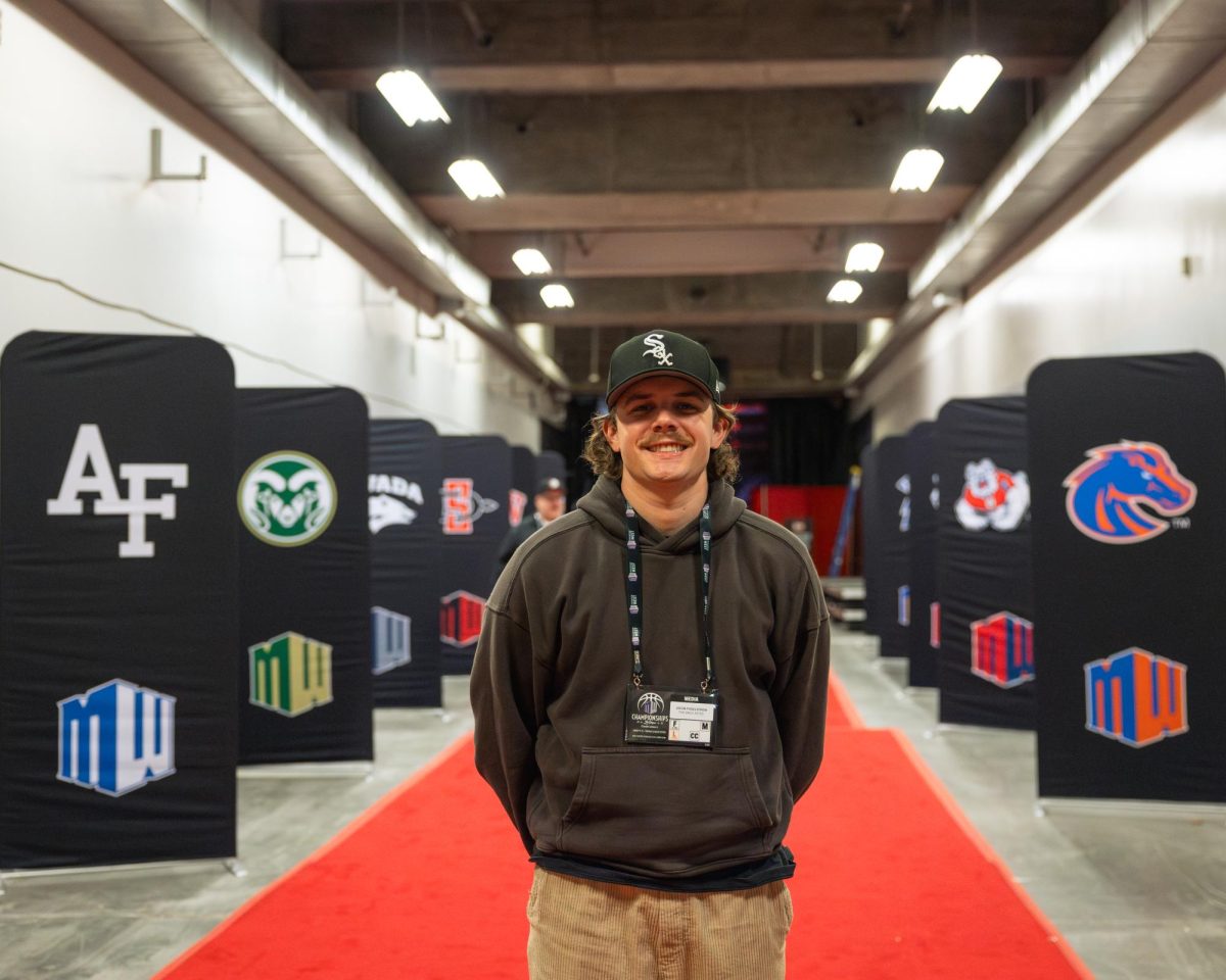 Jacob Fogelstrom, The Daily Aztec's Sports Editor poses for a picture at this year's Mountain West tournament in Las Vegas on Thursday, Mar. 13, 2025. (Courtesy of Jacob Fogelstrom)