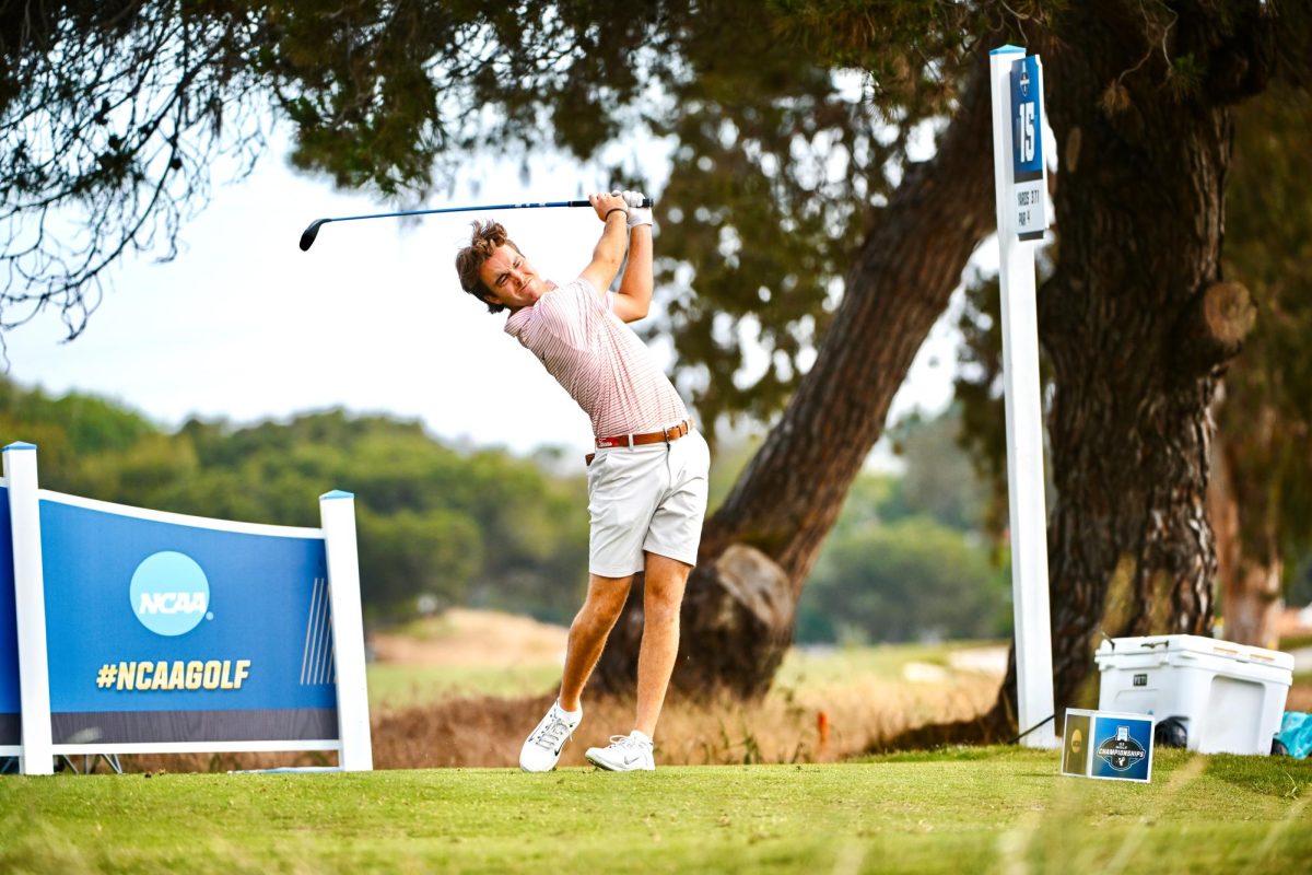 Luke Potter of University of Texas hits his drive off the 15th tee box. Photo courtesy by University of Texas Athletics