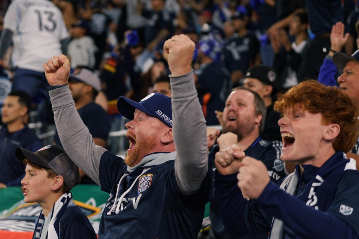 San Diego FC fans cheer after goalkeeper CJ dos Santos saves a Colorado Rapids penalty kick on May 14, 2025 at Snapdragon Stadium. 