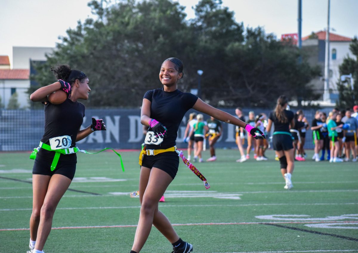 NIL Aztec Link Student-athletes smile after running for the football during practice on Saturday June 21, 2025 at the PG 610 field.