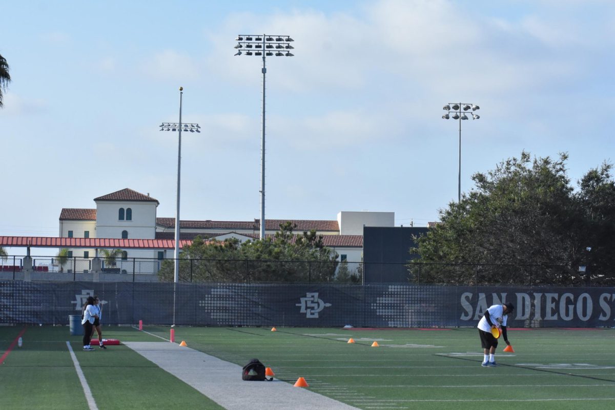 NIL Aztec Link Coach places cones for exercises on Saturday June 21, 2025 at the PG 610 field.