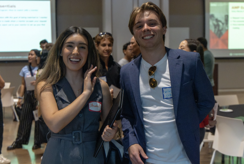 Students smile for the camera during the Aztec Mentor Program networking event on Sept. 25, where mentees and mentors connected to share career advice and professional experience. Photo Courtesy of Jonathan Frederick.