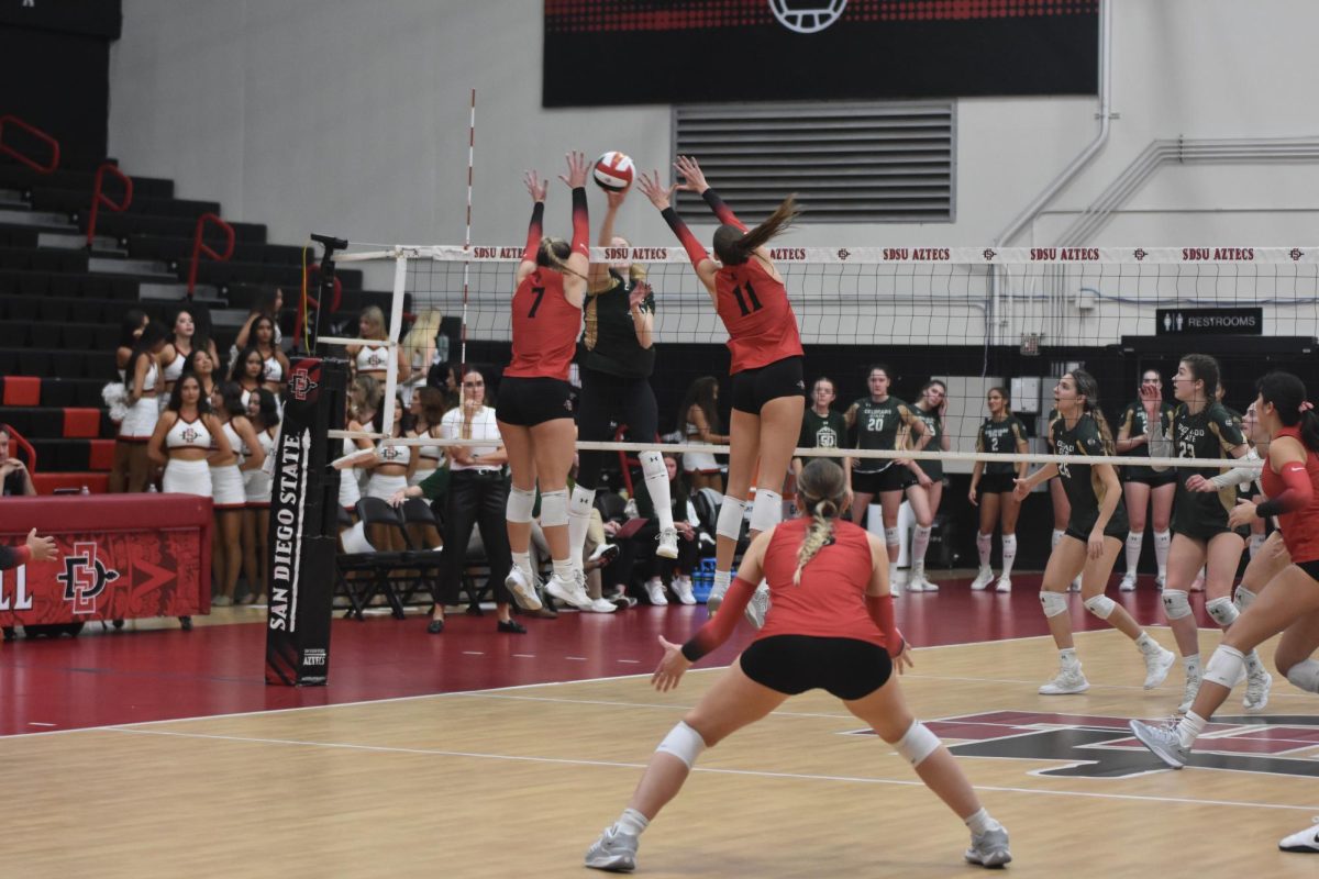San Diego State rises up to block a serve against Colorado State at the Peterson Gym on Thursday, November 13th, 2025. 