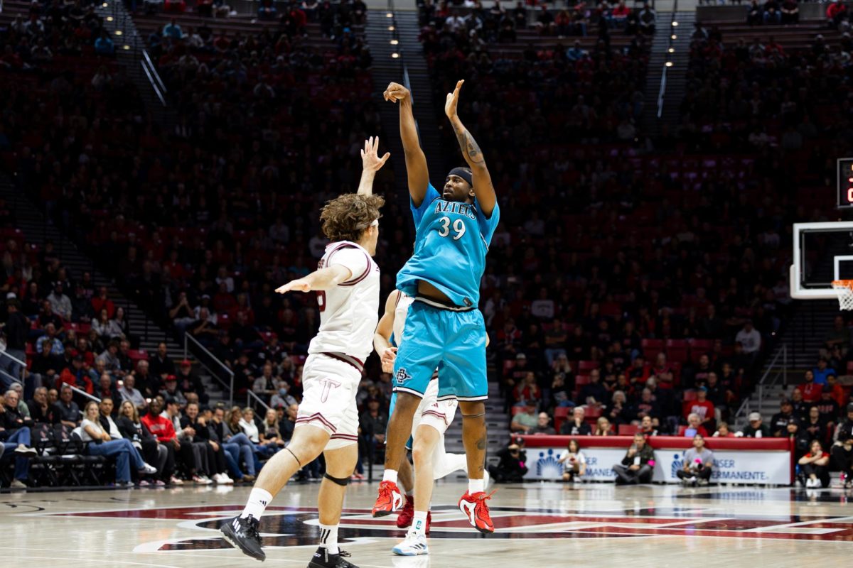 Senior Guard Reese Dixon-Waters goes up for a mid-range shot on Nov. 18th 2025 vs Troy at Viejas Arena.