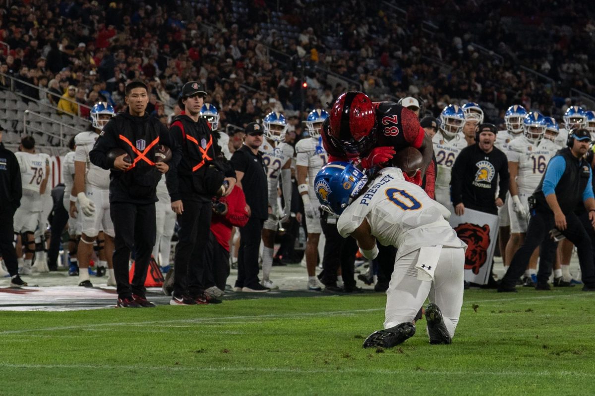 San Diego State freshman wide receiver Jaylon Hawkins fights for extra yards in a 25-3 win over the San Jose State Spartans on Saturday, Nov. 22, 2025, at Snapdragon Stadium. 