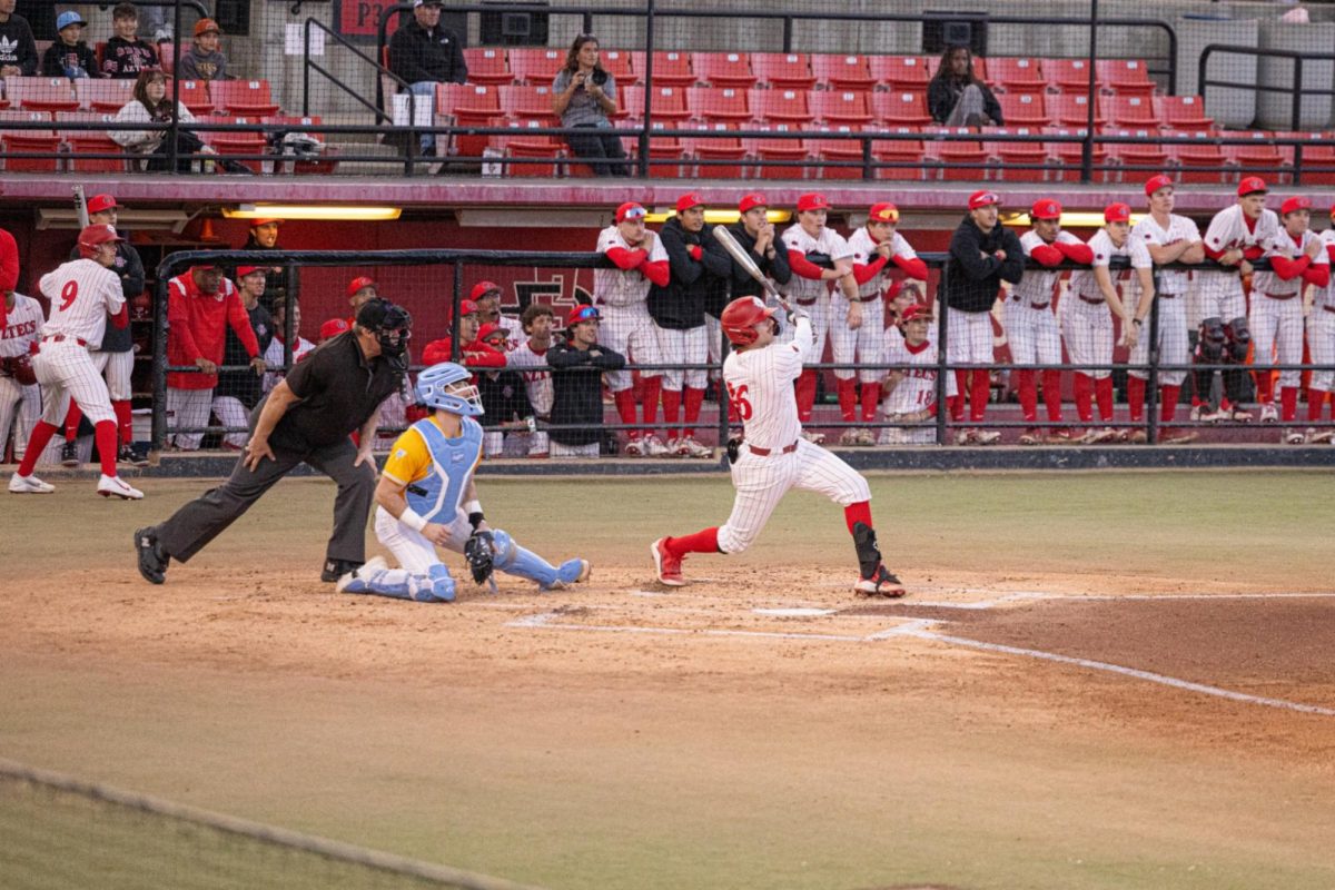 Zach Justic hits a sacrifice fly to center field, advancing Tyce Peterson from 2nd to 3rd base against LIU at Tony Gwynn Stadium on February 14th, 2026.