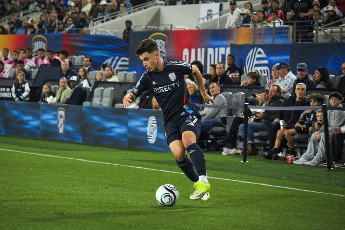 Recently extended through the 2028-29 season, defender Luca Bombino receives a pass coasting down the left flank. 