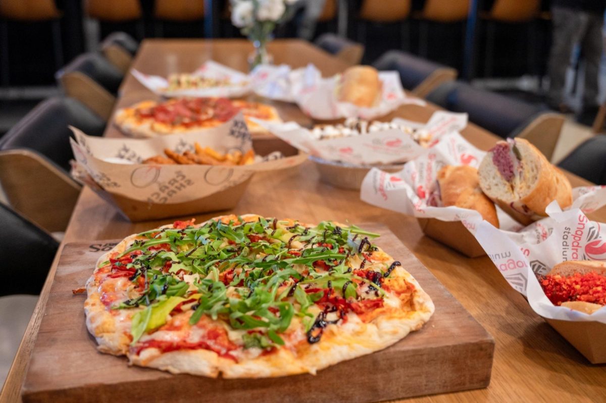 Buona Forchetta's "12' Augusta" Pizza on display alongside other 2026 menu choices
