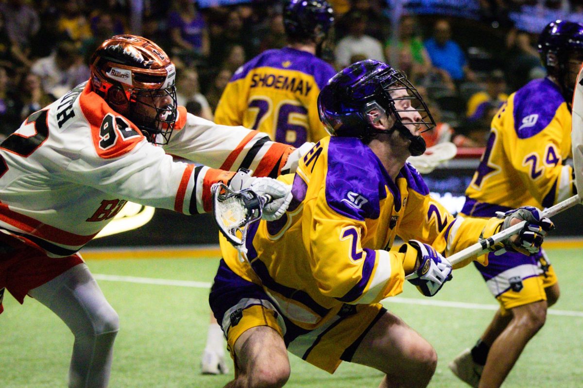 SD Seal defender James Barclay battles through an opponent stick check during the game against
Buffalo Bandits on Mar. 21, 2026