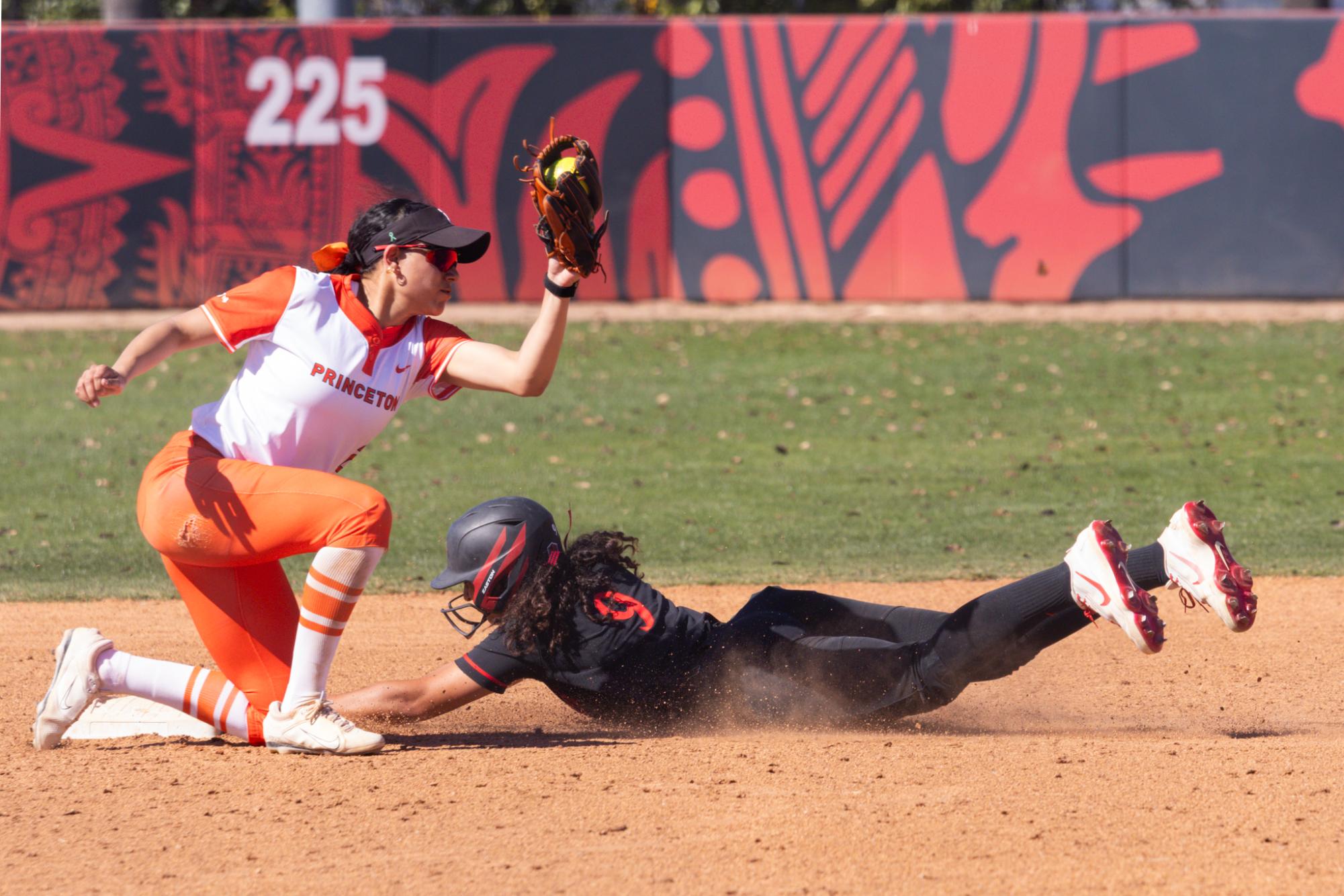 Junior utility Jazmin Williams dives head first into 2nd base for the steal during the game against Princeton University on Mar. 8, 2026
