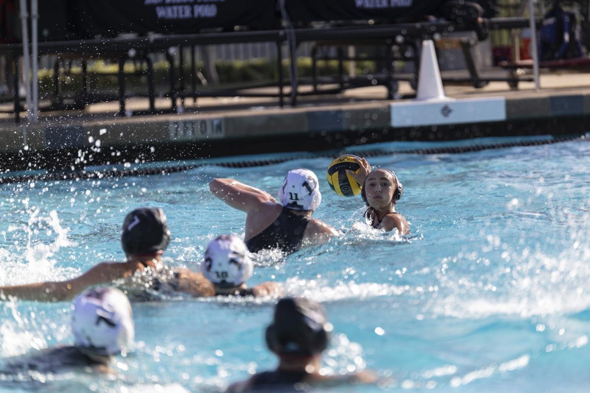 San Diego State freshman attacker Natalia Barrot scans for a passing option during a 12-5 win against Brown University on Friday, Mar. 27, 2026 at the Aztec Aquaplex.