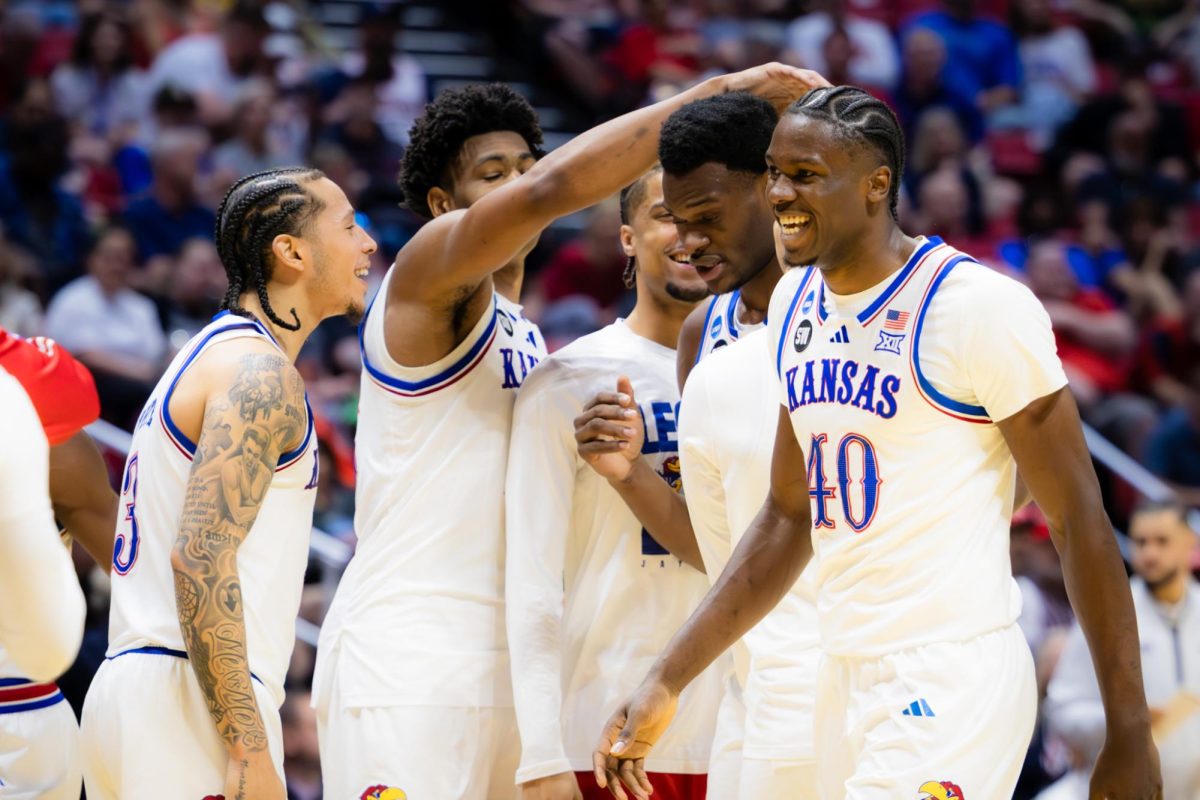 The Jayhawk players celebrate their run during a timeout in the NCAA first-round game against CBU on Mar. 20, 2026 (Jadeyn Larson)
