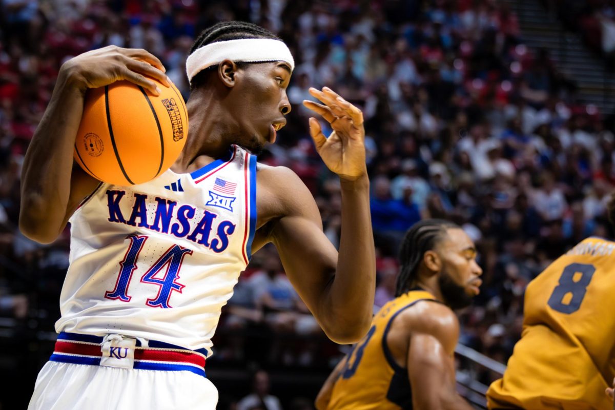 Kansas guard Melvin Council Jr. looks up court for an open pass during the NCAA first-round game
against CBU on Mar. 20, 2026 (Jadeyn Larson)
