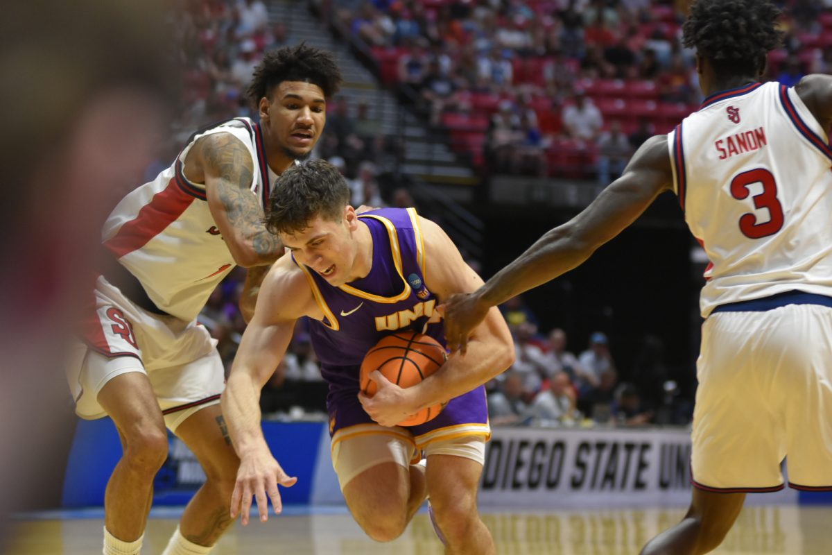 Northern Iowa player battles for possession against the defenders, for a chance of a shot at the Viejas Arena on Friday, March 20th. 