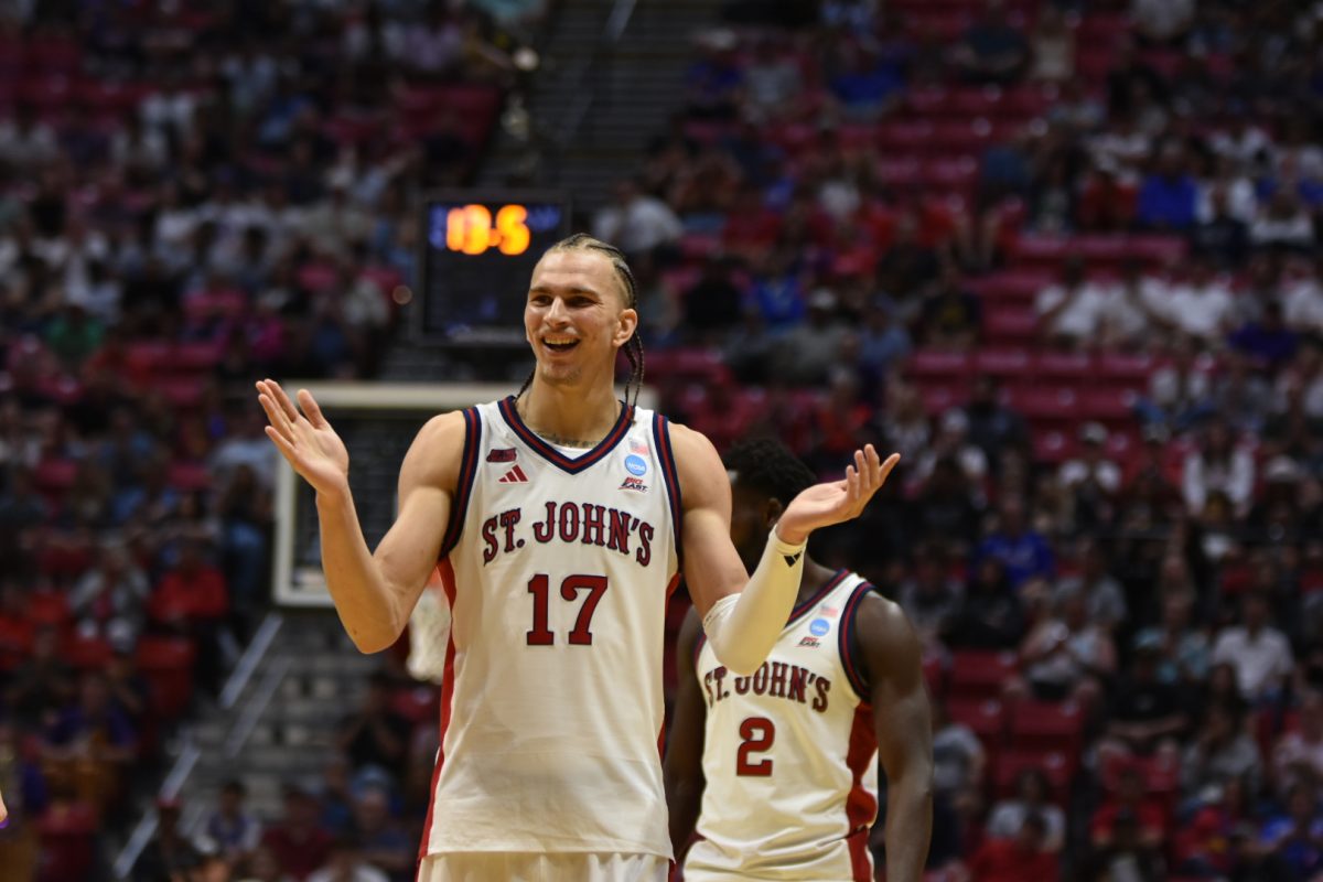 Ruben Prey, celebrates his teams big win against Northern Iowa at the Viejas Arena on Friday, March 20th. 