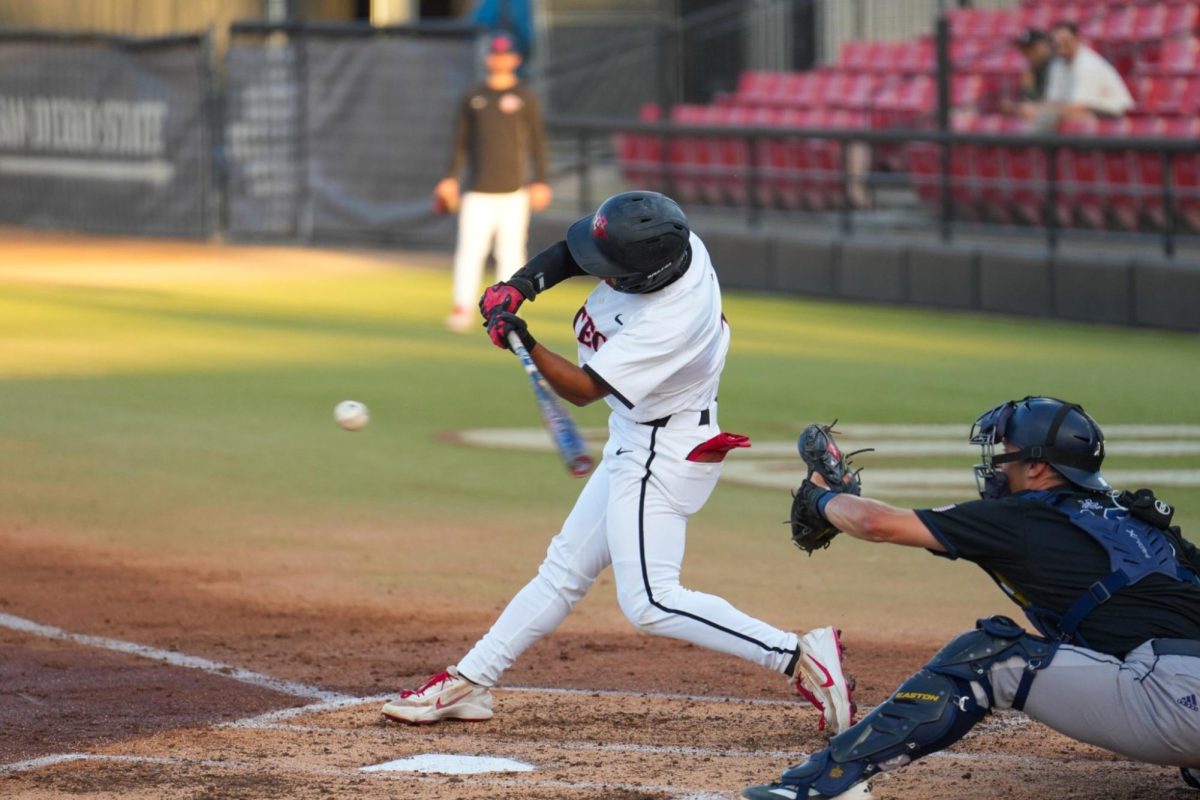 San Diego State’s No. 2 Adam Magpoc (Jr.)  connects for a hit during the Aztecs’ 8–4 win over UC Irvine on March 24, 2026, at Tony Gwynn Stadium.