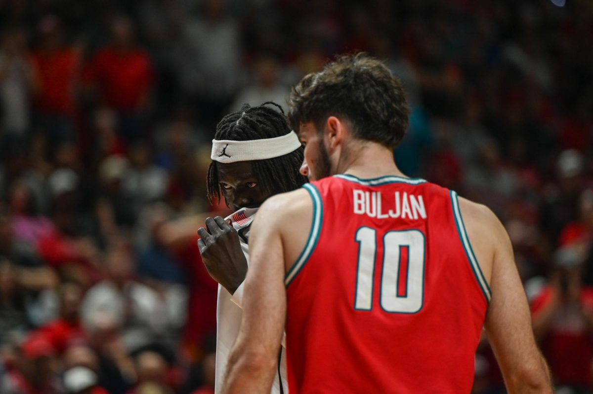 Freshman Forward Tomislav Buljan goes to guard Sophomore Forward Magoon Gwath during SDSU’s game against University of New Mexico on Friday March 14, 2026