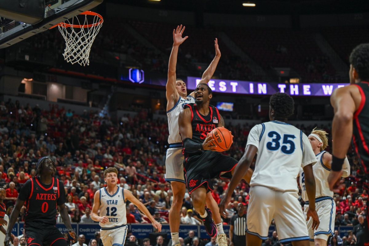 Senior Guard Reese Dixon-Waters leaps for the basket during SDSU's game against Utah State on Sat. March 14, 2026