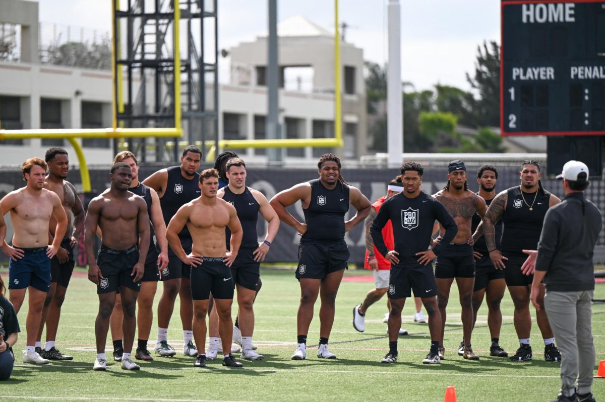 College football athletes recieve instruction from a coach during the NFL Pro Day on Wednesday March 11, 2026 at San Diego State University