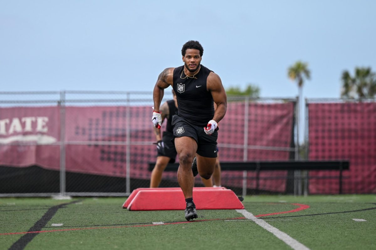 Linebacker Mister Williams runs through a drill during the NFL Pro Day on Wednesday March 11, 2026 at San Diego State University