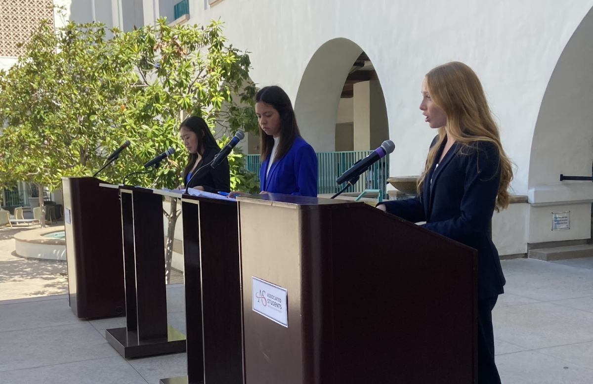 Jamie Quach, Celina Ramirez and Scarlett Walker (left to right) debate each other in their race for Associated Students vice president of external relations at the Conrad Prebys Aztec Student Union Courtyard on March 18, 2026.