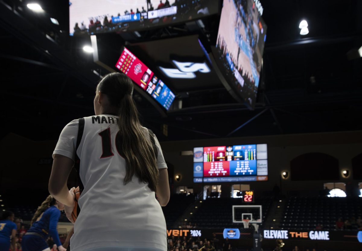 Sophomore guard Nat Martinez prepares to pass the ball from the sidelines during the game against the McNeese State Cowgirls on Mar. 22, 2026
