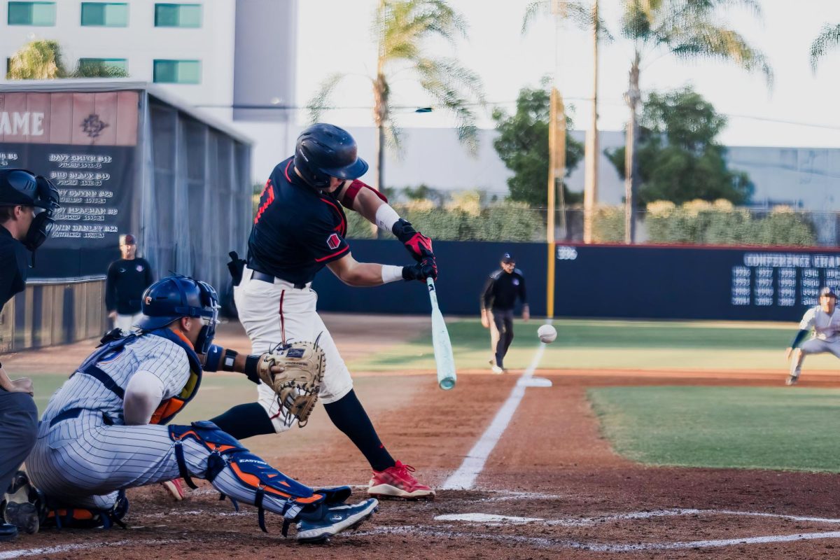 San Diego State freshman utility player Max Farrell barrels a fastball during the game against Cal State Fullerton at Tony Gwynn Stadium on Apr. 28, 2026.