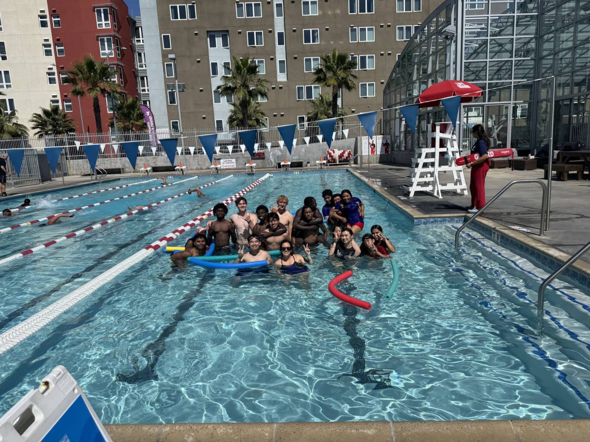 Hoover PE class having a great time at the pool participating in free swim lessons. [Photo Credit: Vanessa Stahley]