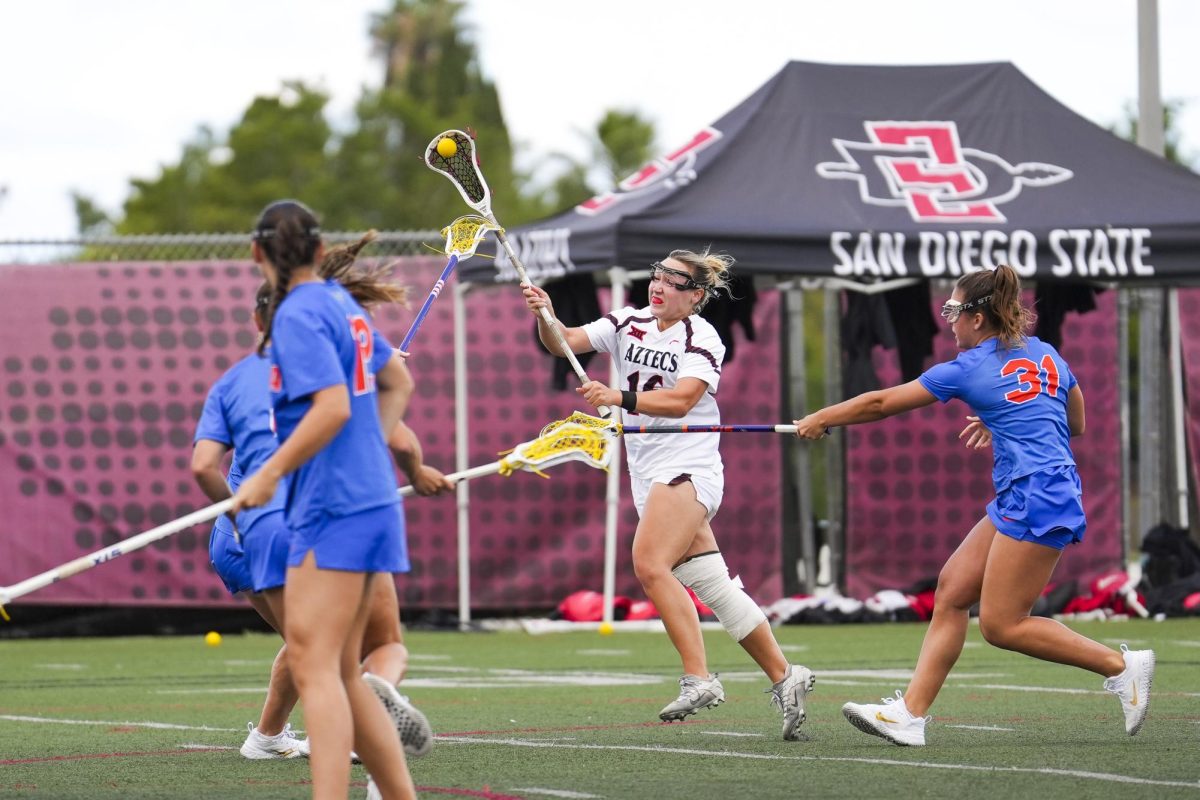 San Diego State attacker #16 Tate Stokesberry shoots and scores during a game against the Florida Gators on Saturday, April 11, 2026, at the Aztec Lacrosse Field.