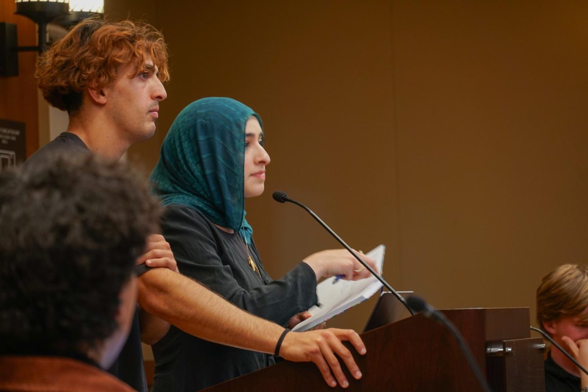 Yucef Bouzina (right) and Samar Ismail (left), addressing the ASUC about the intent of the Mokat Act inside the Council Chambers. April 8, 2026.
