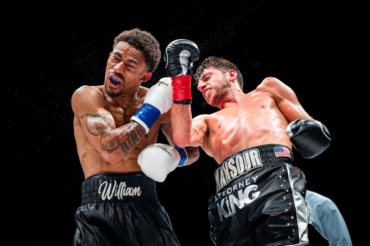 Jonny Mansour throwing a straight punch at William King during SD Fight Night: Family Business at Frontwave Arena on April 18, 2026. 